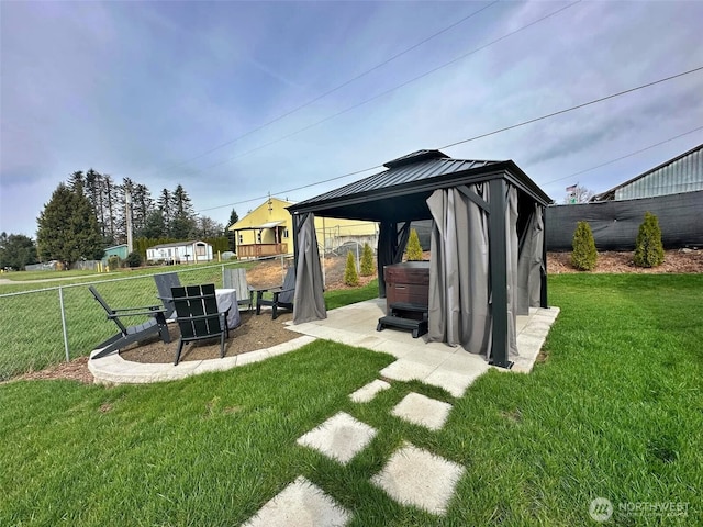 view of yard with a gazebo and fence