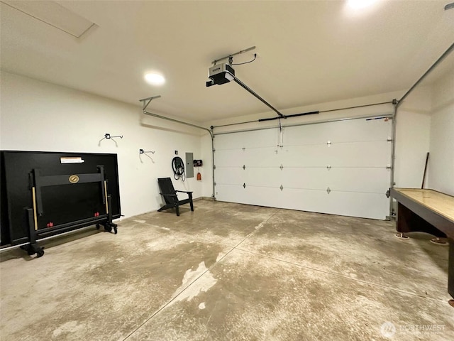 garage featuring a garage door opener