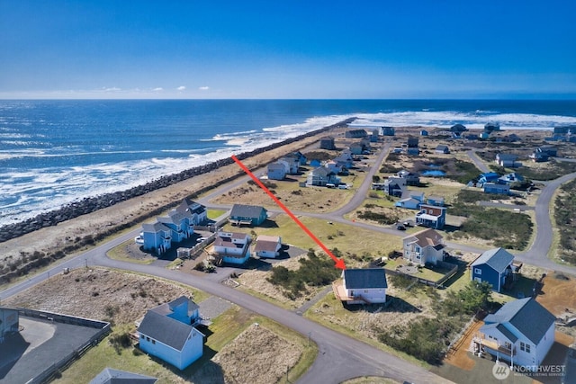 aerial view with a beach view and a water view