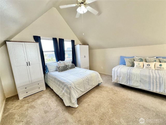 bedroom with baseboards, light colored carpet, ceiling fan, and vaulted ceiling