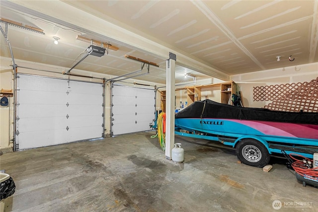 garage featuring a garage door opener