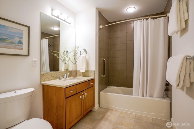 full bathroom with vanity, toilet, shower / tub combo, and tile patterned flooring