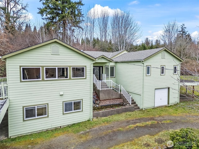 view of front of property featuring an attached garage