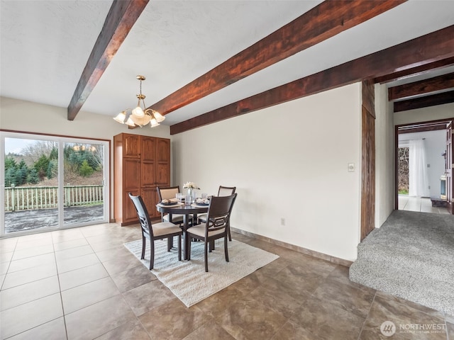 dining space with baseboards, a chandelier, beamed ceiling, light colored carpet, and light tile patterned flooring