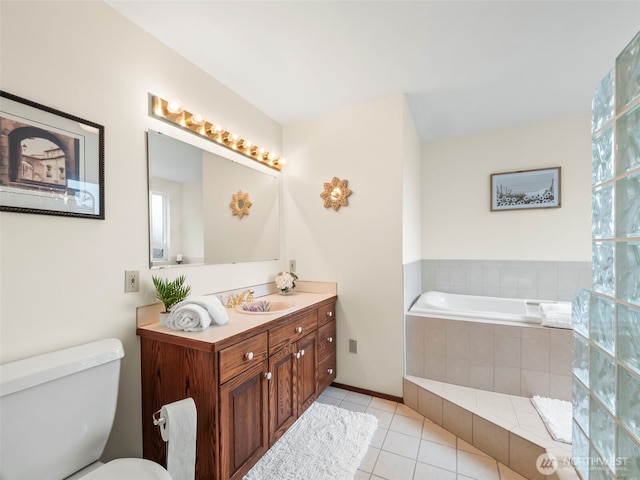 full bath featuring a bath, tile patterned floors, toilet, and vanity