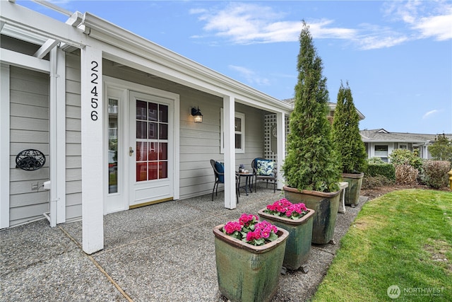 view of patio featuring a porch