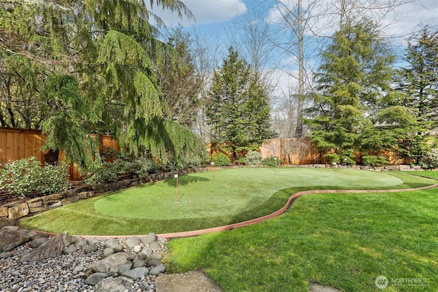 view of yard featuring a fenced backyard