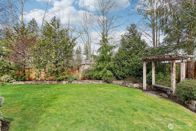 view of yard with fence