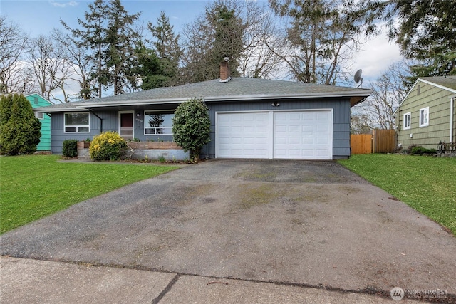 ranch-style home with a front lawn, aphalt driveway, fence, an attached garage, and a chimney