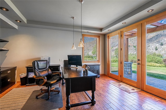 office area featuring baseboards, recessed lighting, and wood finished floors