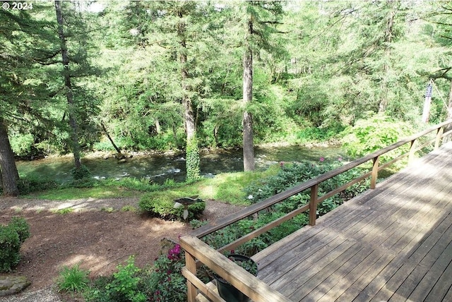 deck featuring a view of trees