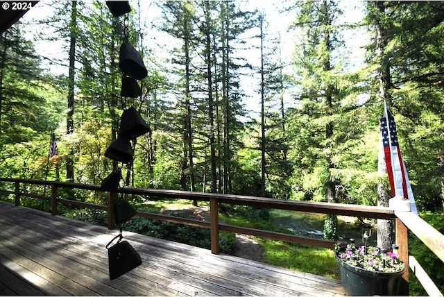 deck with a wooded view