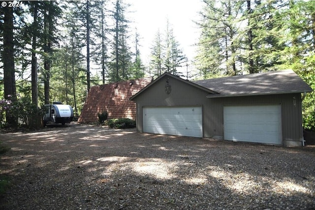 garage featuring driveway