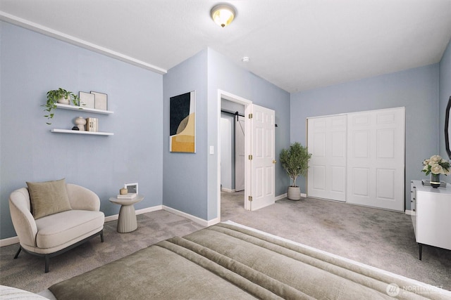 interior space with a closet and baseboards