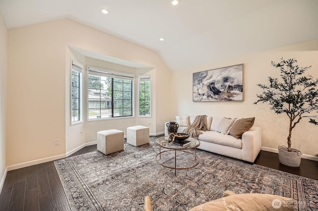 living room with recessed lighting, wood finished floors, baseboards, and vaulted ceiling