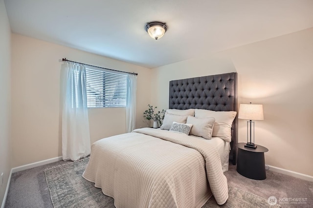 carpeted bedroom with baseboards