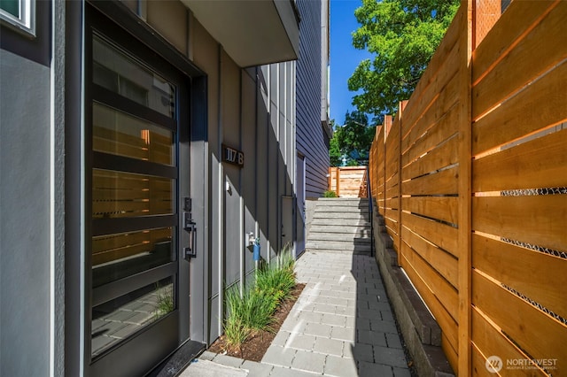 view of home's exterior featuring fence and stucco siding