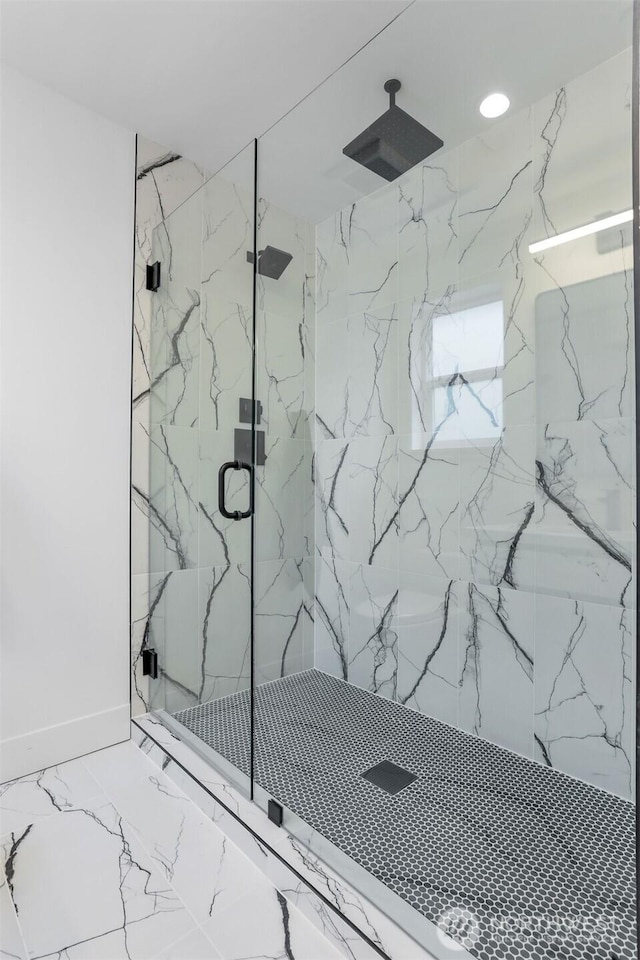 bathroom featuring recessed lighting, a marble finish shower, and marble finish floor