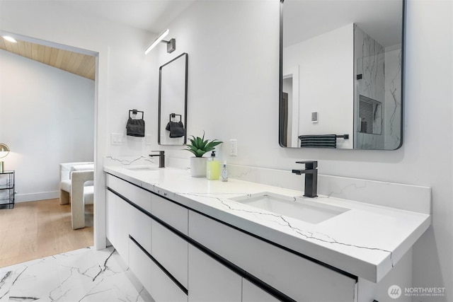 full bathroom featuring double vanity, wooden ceiling, and a sink