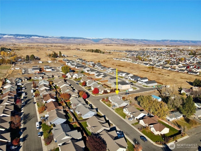 bird's eye view featuring a mountain view and a residential view