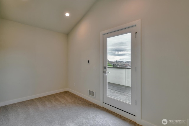 entryway with visible vents, baseboards, vaulted ceiling, carpet floors, and recessed lighting