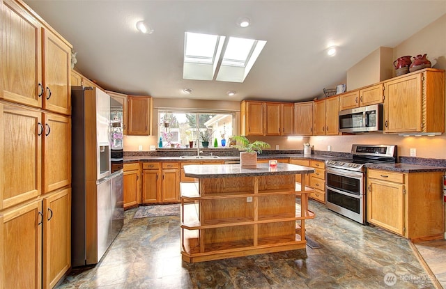 kitchen with open shelves, a sink, appliances with stainless steel finishes, lofted ceiling with skylight, and a center island