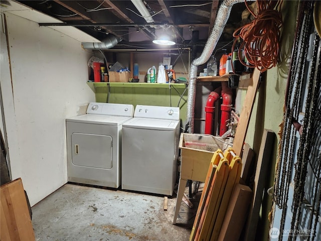 laundry area with washer and dryer and laundry area