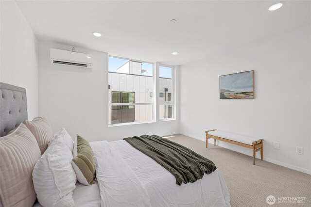 bedroom with recessed lighting, baseboards, a wall mounted AC, and carpet