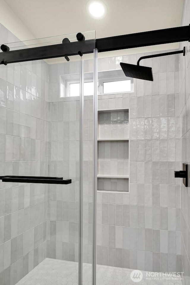 bathroom featuring a stall shower