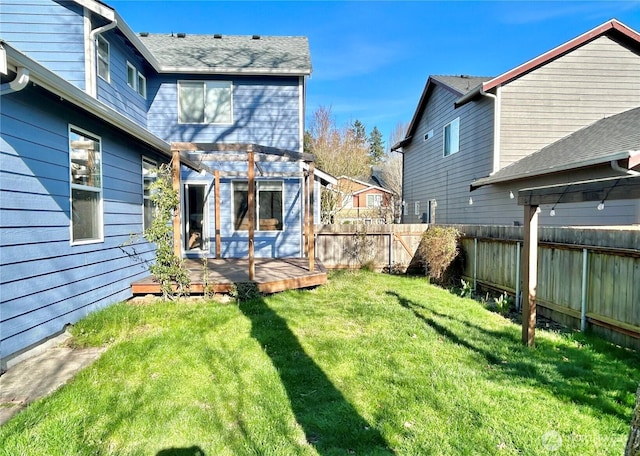 view of yard featuring fence, a pergola, and a wooden deck