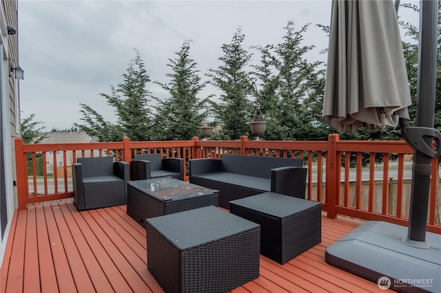 wooden deck with outdoor lounge area