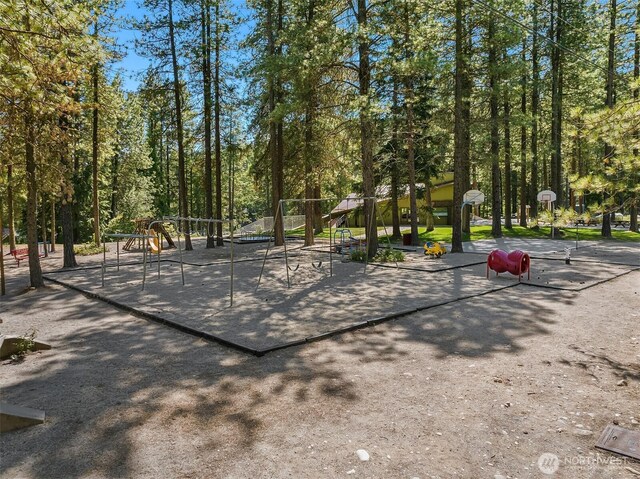 view of property's community featuring playground community