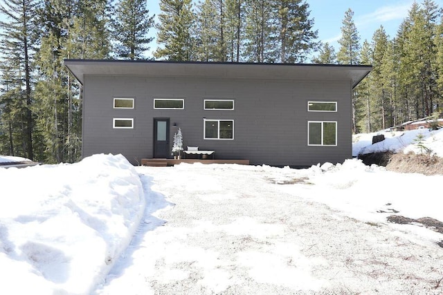 view of snow covered property