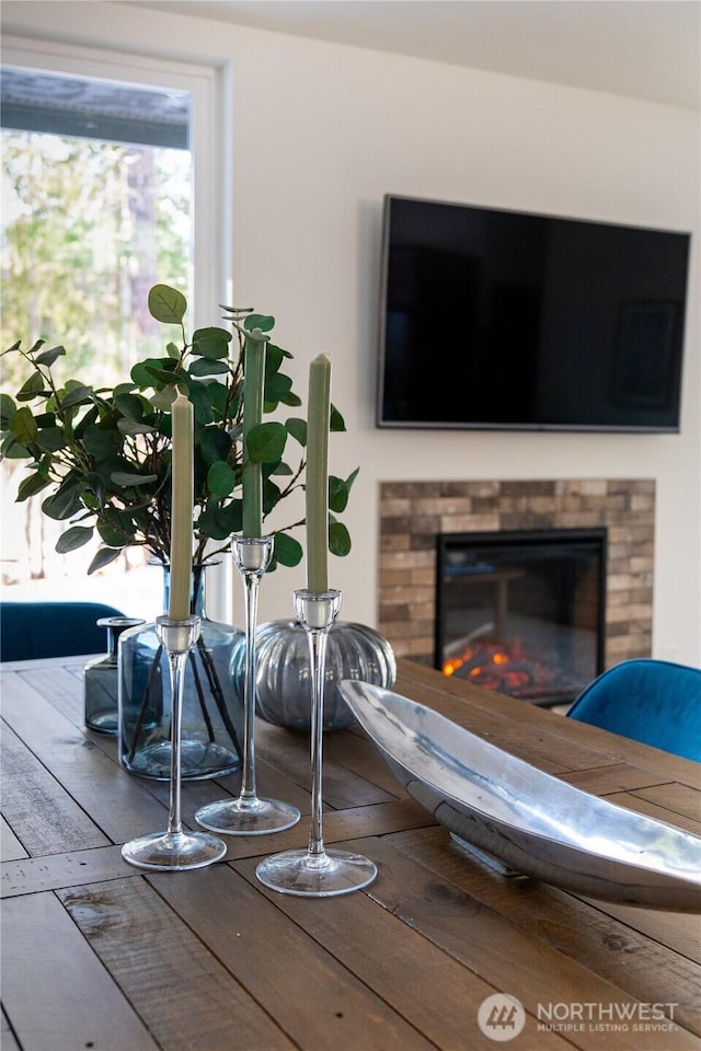 room details featuring a glass covered fireplace