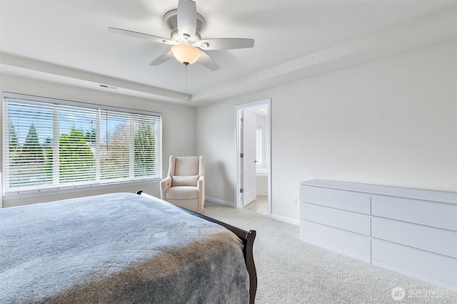 carpeted bedroom featuring a ceiling fan and baseboards