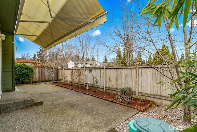 view of yard featuring a fenced backyard and a patio