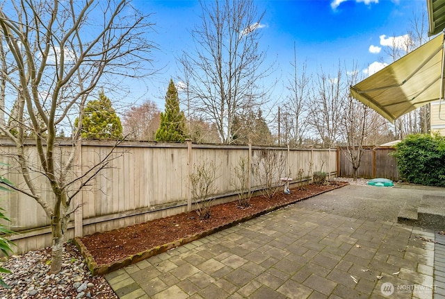 view of patio with a fenced backyard