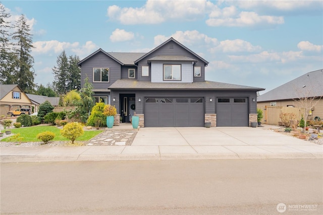 16103 NE 102nd Way, Vancouver, WA 98682 - view of front of property featuring stone siding, driveway, and a garage
