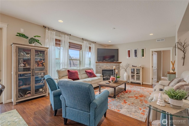 16103 NE 102nd Way, Vancouver, WA 98682 - living room featuring a fireplace, wood finished floors, and recessed lighting