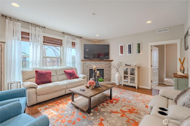 16103 NE 102nd Way, Vancouver, WA 98682 - living room featuring wood finished floors, a fireplace, recessed lighting, and baseboards