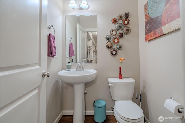 16103 NE 102nd Way, Vancouver, WA 98682 - half bath featuring toilet, baseboards, a sink, and wood finished floors