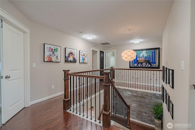 16103 NE 102nd Way, Vancouver, WA 98682 - corridor featuring an upstairs landing, wood finished floors, and baseboards