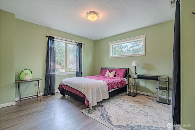 16103 NE 102nd Way, Vancouver, WA 98682 - bedroom with wood finished floors and baseboards