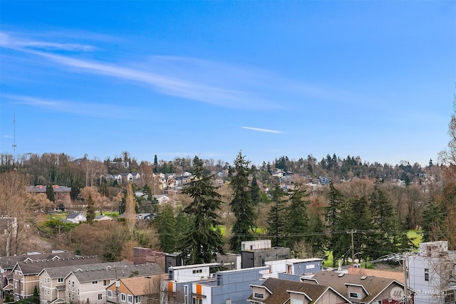 birds eye view of property with a residential view