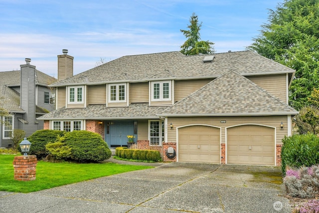 traditional-style house with driveway, roof with shingles, a front lawn, a garage, and brick siding