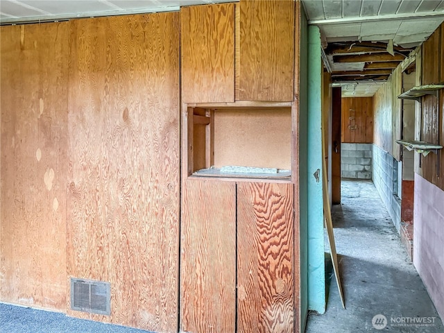 interior space featuring visible vents and concrete flooring