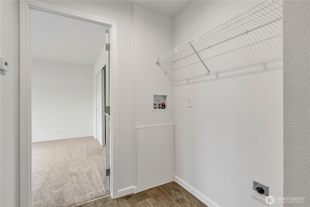 laundry area with electric dryer hookup, wood finished floors, carpet flooring, hookup for a washing machine, and laundry area