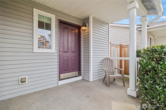 entrance to property with covered porch