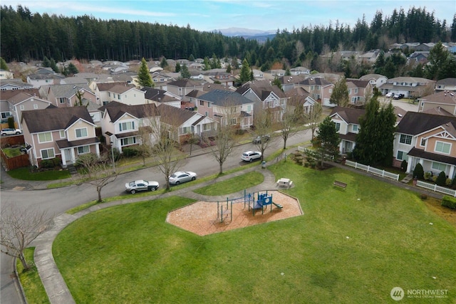 birds eye view of property with a residential view