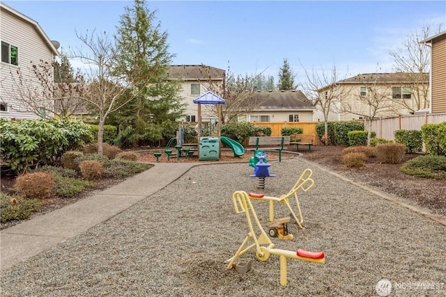 community playground featuring fence